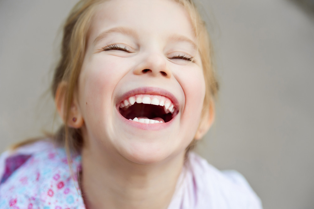 little girl laughing